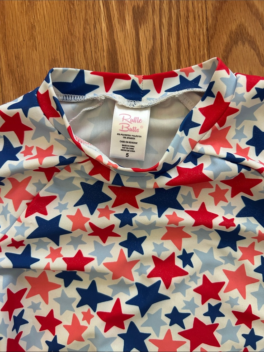 Ruffle Butts Red White Blue Star Ruffle Rashguard Set - Picture 2 of 3